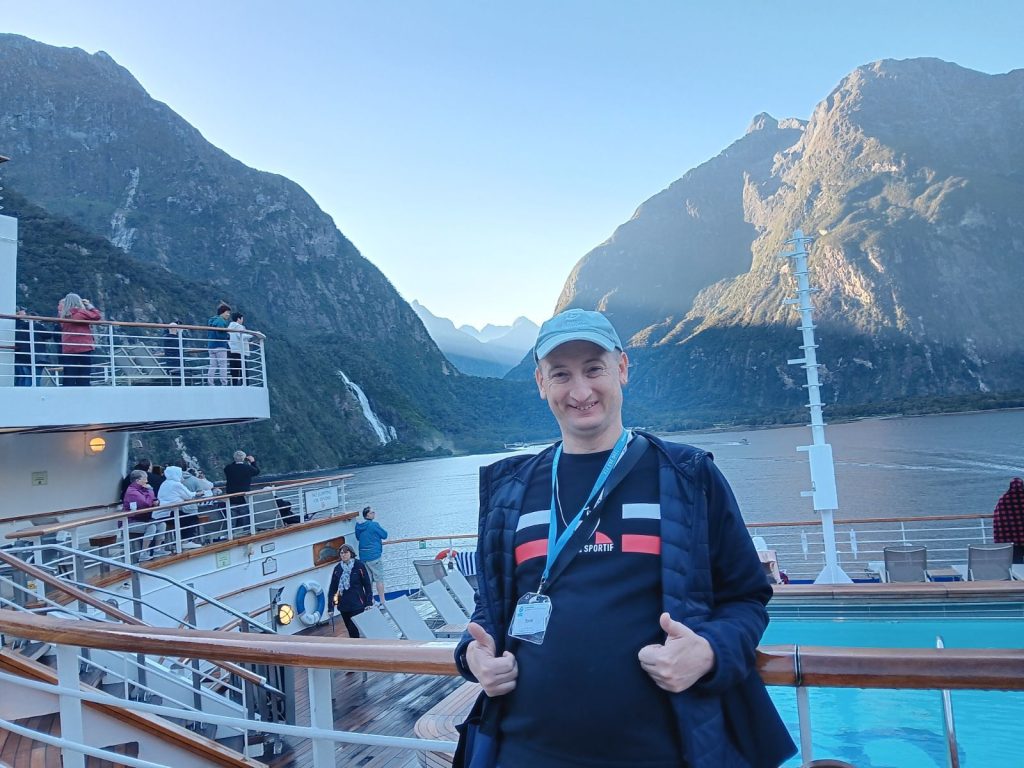 Leisure Options traveller, Steve, absorbing the views at Milford Sound in New Zealand aboard the Grand Princess Cruise.